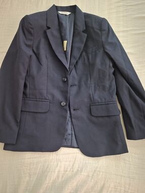 Classic Navy Two-Button Blazer.        Brand new—the tag just fell off.